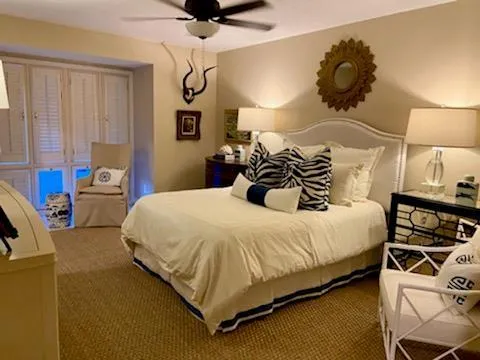 a living room with furniture and decor