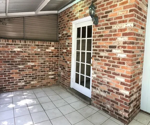 a kitchen with a stove a refrigerator and a sink
