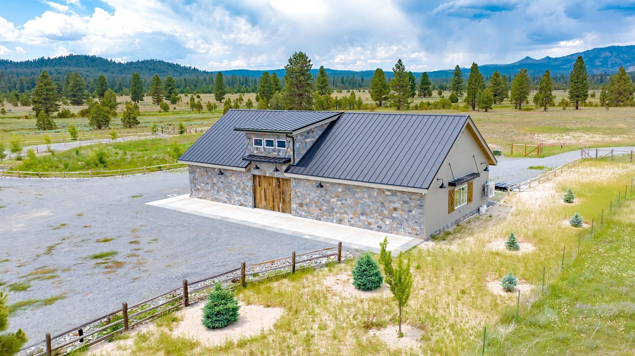 6200 Westside Road Calpine, CA 96124 - Photo 16 of 21 a view of a house with a yard