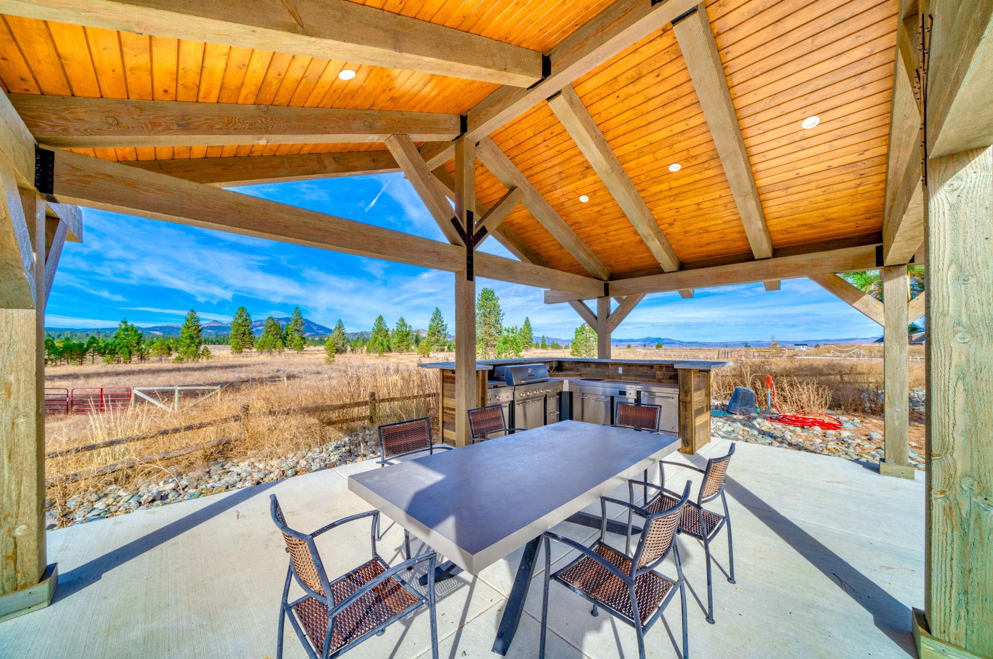 6200 Westside Road Calpine, CA 96124 - Photo 17 of 21 a view of a chairs and table in patio