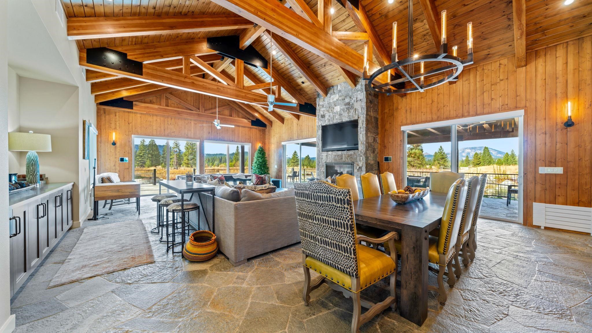 6200 Westside Road Calpine, CA 96124 - Photo 4 of 21 a view of a patio with dining table and chairs