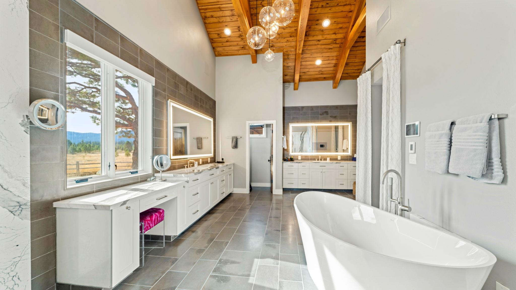6200 Westside Road Calpine, CA 96124 - Photo 6 of 21 a bathroom with a tub sink and mirror