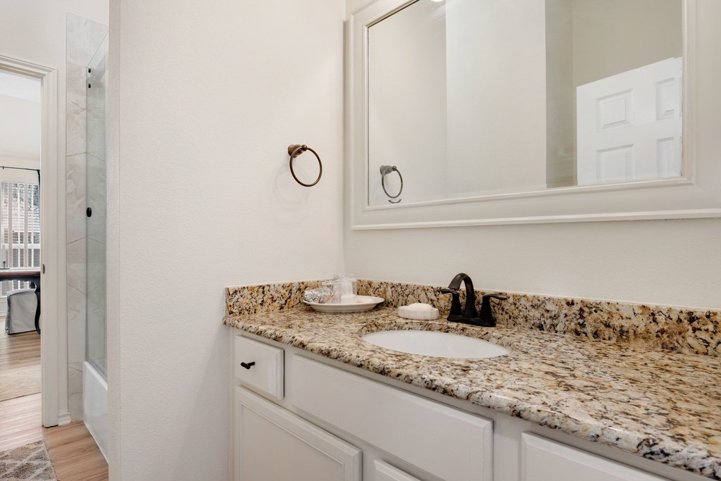 322 River Bluff Circle Georgetown, TX 78626 - Photo 25 of 35 a bathroom with a sink and vanity