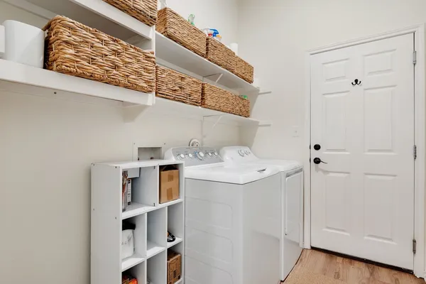 a utility room with cabinets