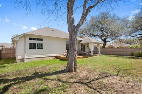 a house with garden in front of it