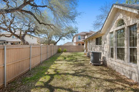 a view of backyard of house