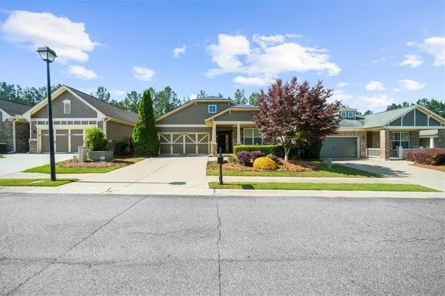 a view of house with swimming pool and porch with furniture