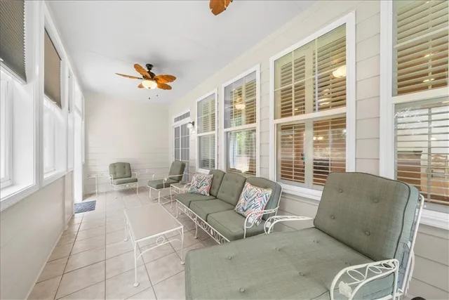 a living room with furniture and a window