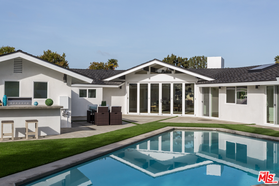 2048 Commodore Road Newport Beach, CA 92660 - Photo 31 of 39 a front view of a house with a yard