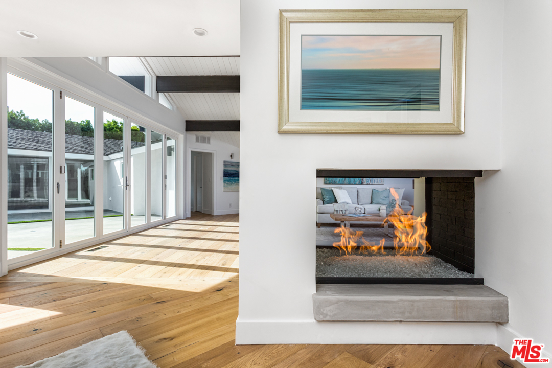 2048 Commodore Road Newport Beach, CA 92660 - Photo 6 of 39 a view of living room filled with furniture and a fireplace
