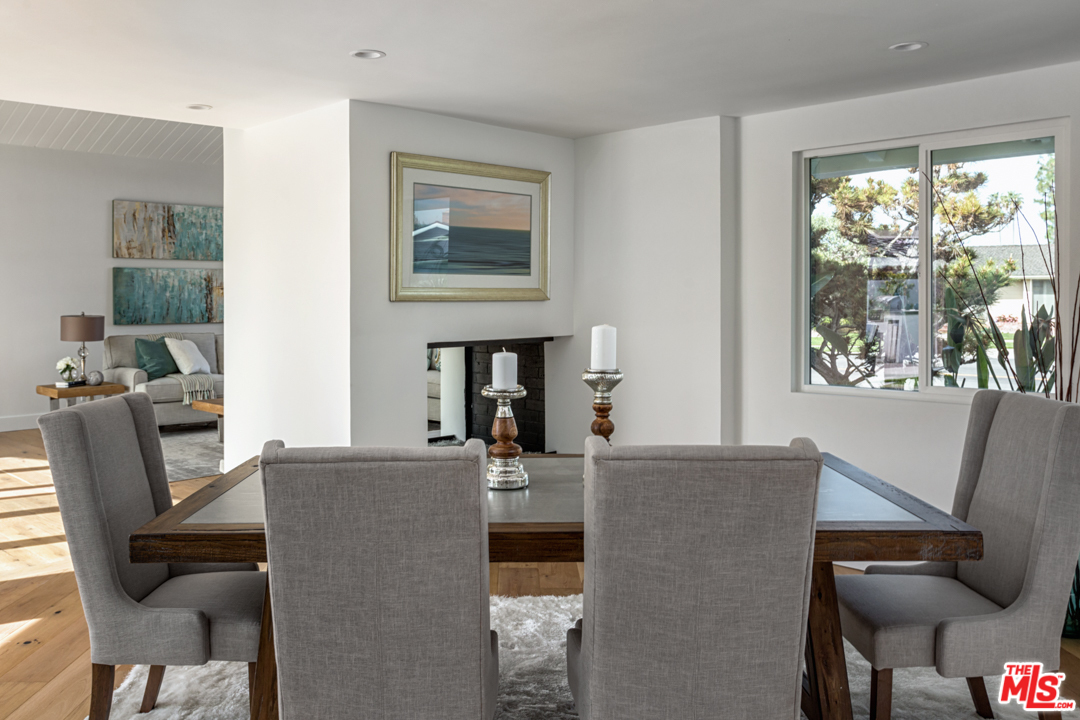 2048 Commodore Road Newport Beach, CA 92660 - Photo 10 of 39 a living room with furniture and large windows