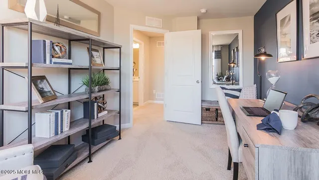 a view of a livingroom with furniture and toys
