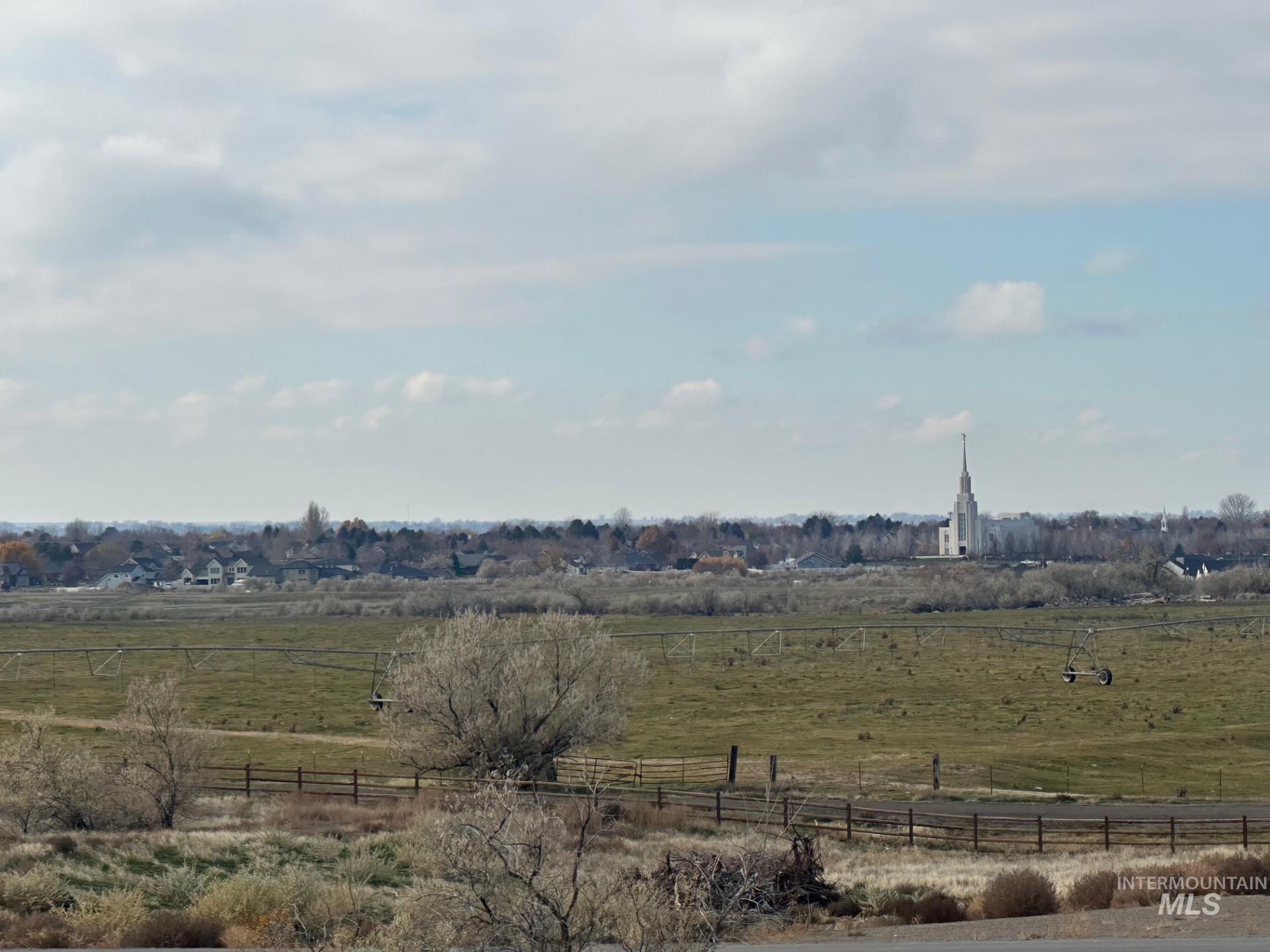 3035 Lake View Twin Falls, ID 83301 - Photo 13 of 18 Expansive rural landscape featuring a prominent white steeple structure on the horizon