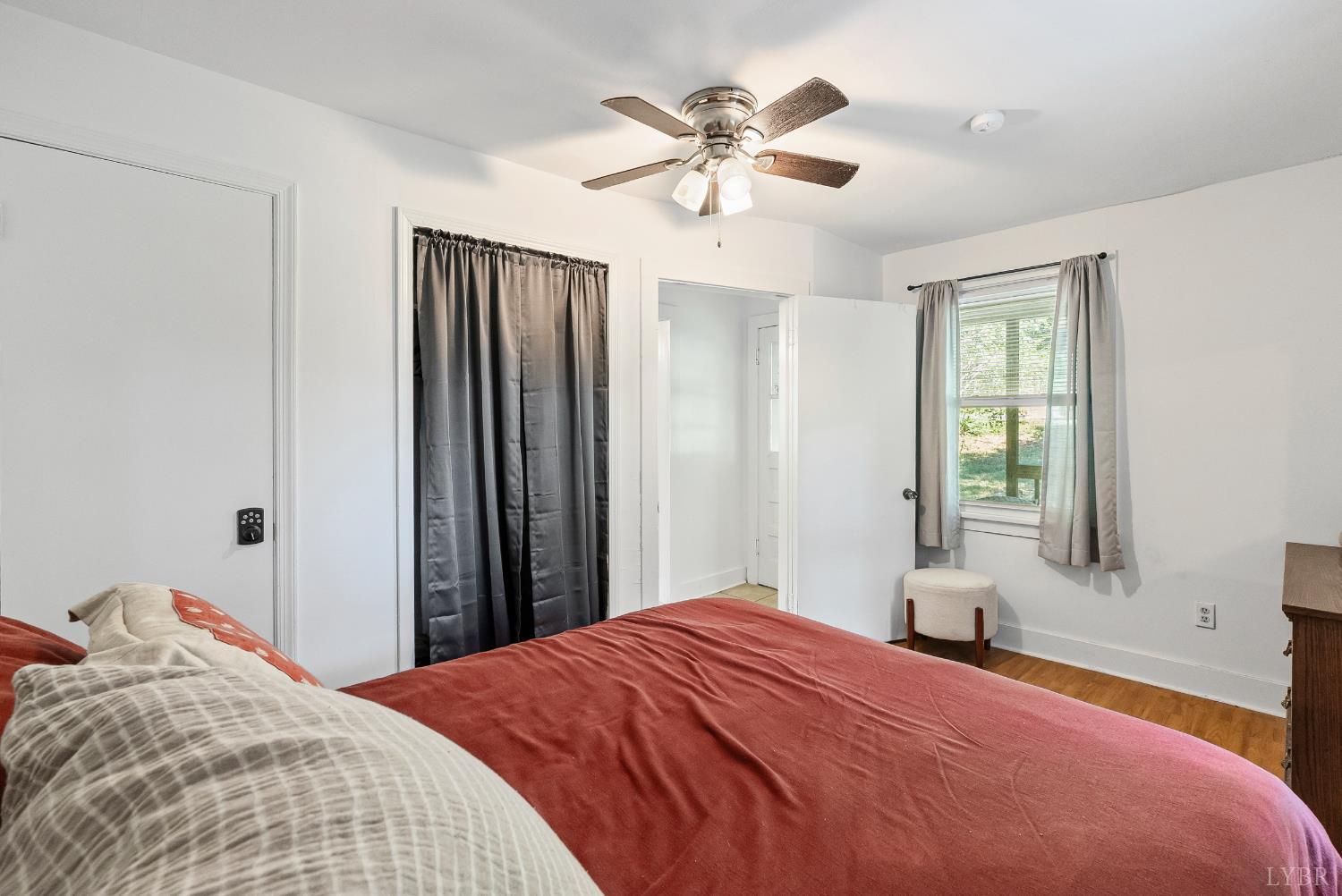 3660 Depot Road Rustburg, VA 24588 - Photo 19 of 36 a bedroom with a large bed and a window