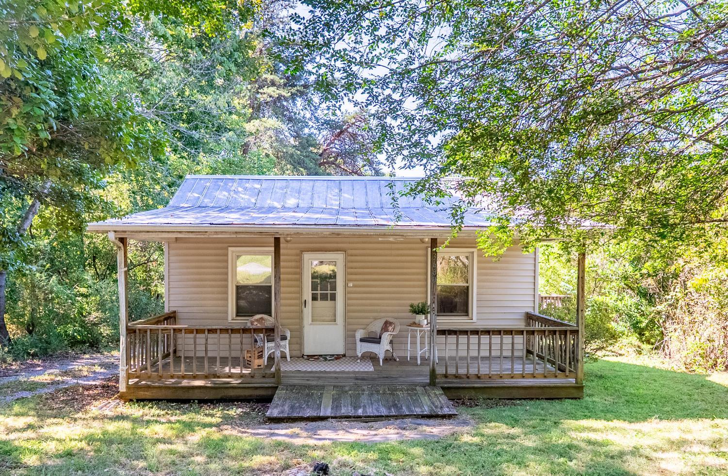 3660 Depot Road Rustburg, VA 24588 - Photo 2 of 36 a front view of a house with garden