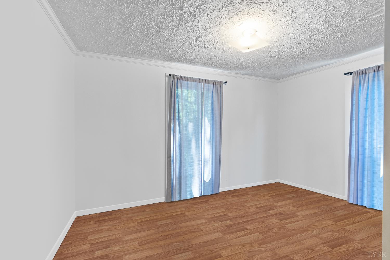 3660 Depot Road Rustburg, VA 24588 - Photo 21 of 36 a view of empty room with wooden floor