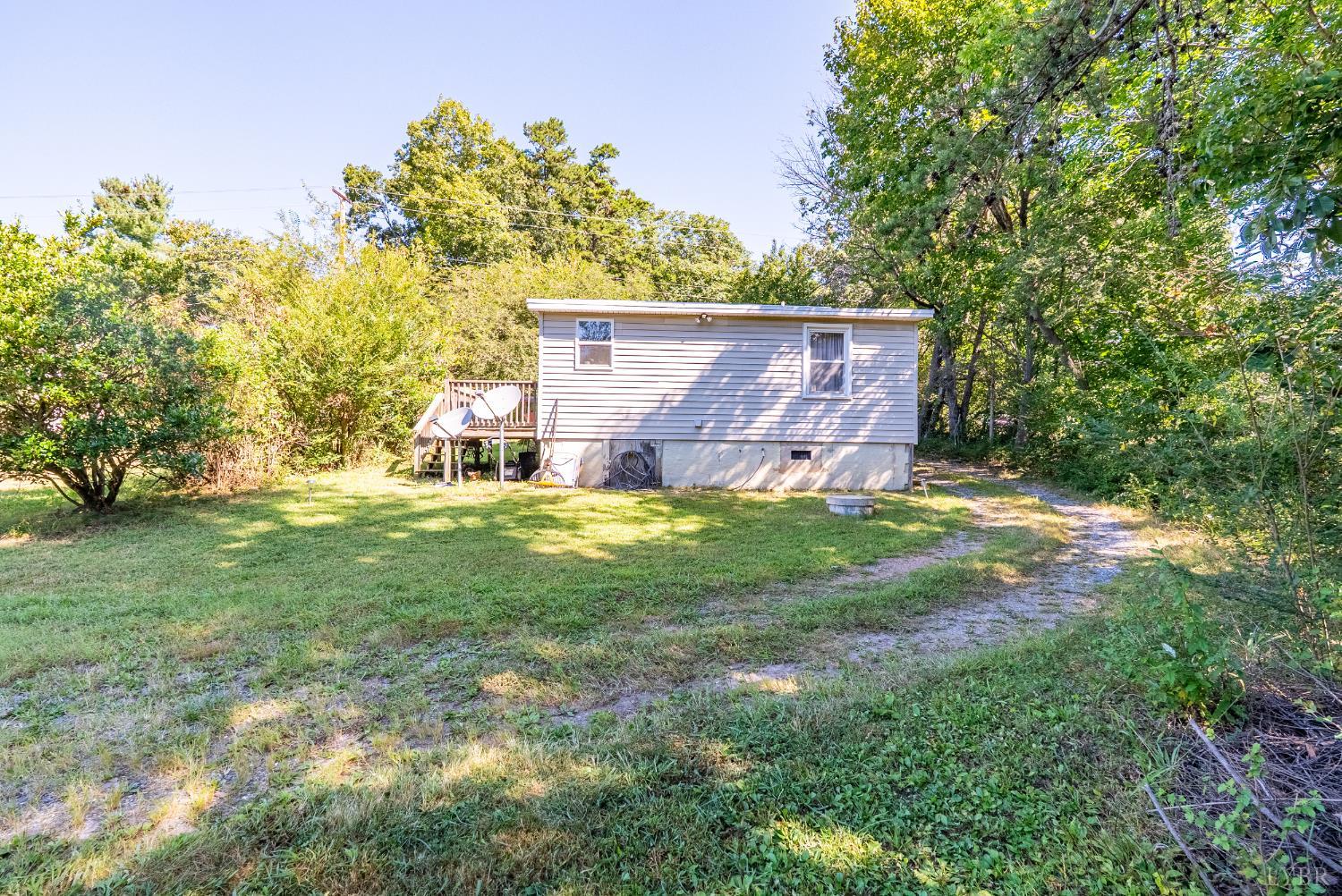 3660 Depot Road Rustburg, VA 24588 - Photo 29 of 36 a view of a yard with plants and trees