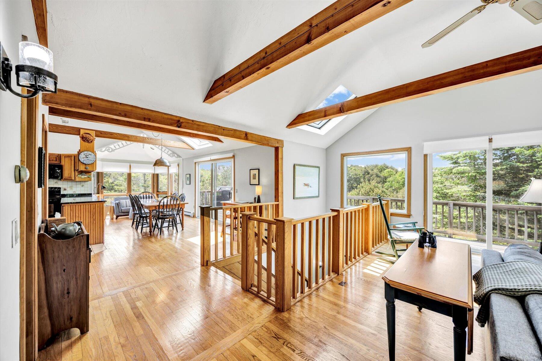 3 Amber Way Truro, MA 02666 - Photo 14 of 43 a living room with furniture and a large window