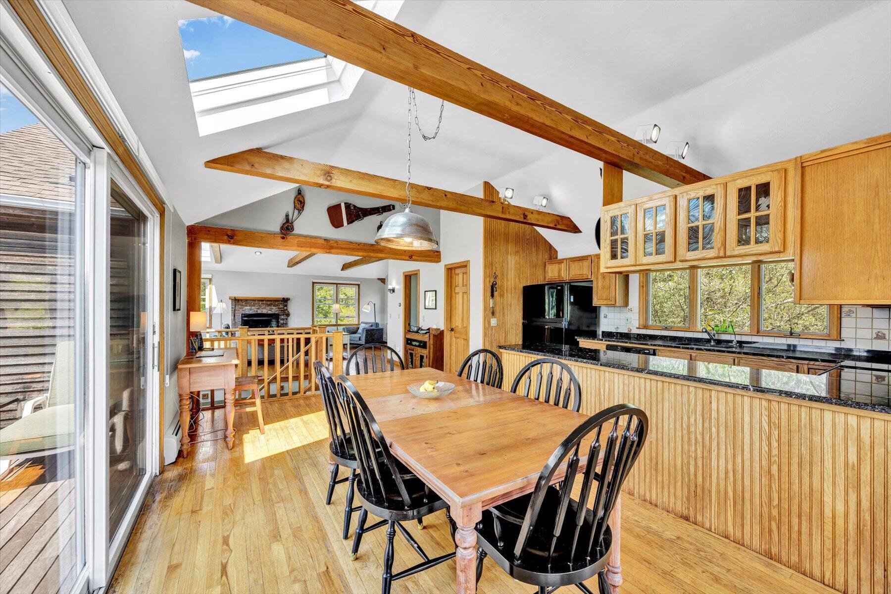 3 Amber Way Truro, MA 02666 - Photo 22 of 43 a dining room with furniture and wooden floor