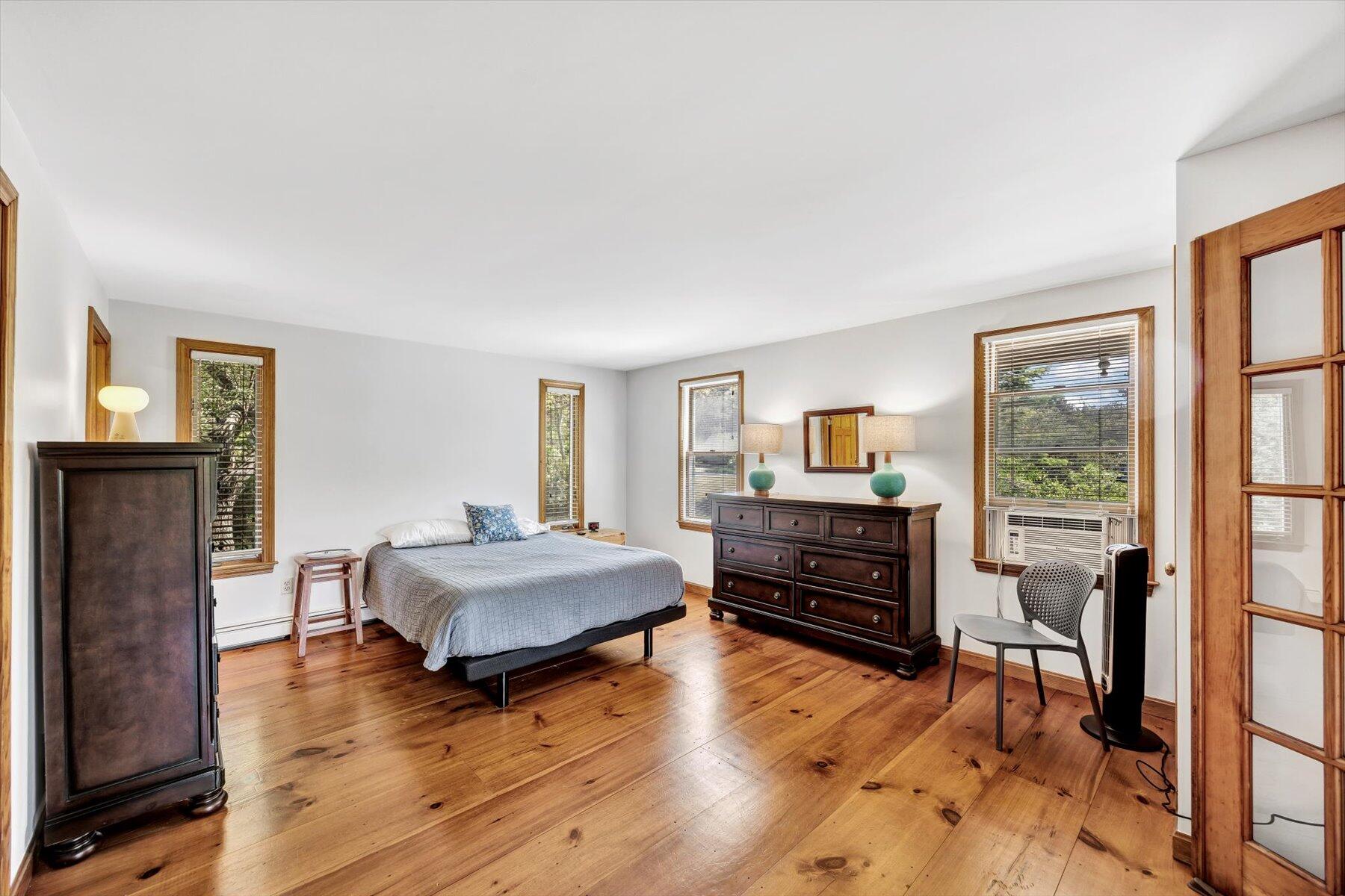 3 Amber Way Truro, MA 02666 - Photo 31 of 43 a living room with furniture and a wooden floor