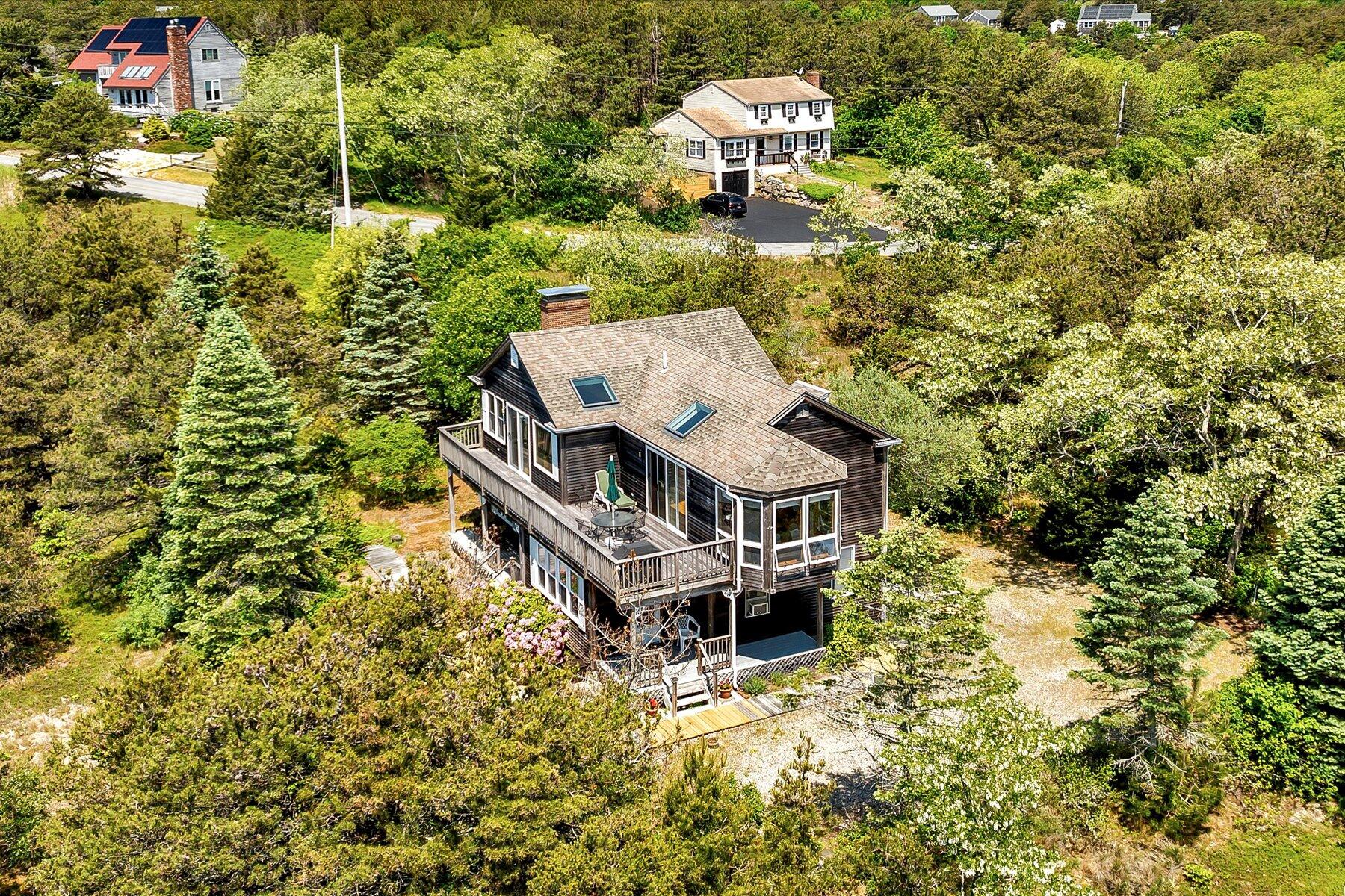 3 Amber Way Truro, MA 02666 - Photo 8 of 43 an aerial view of a house with a yard