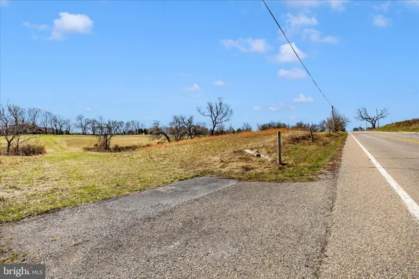 a view of mountain view with large trees