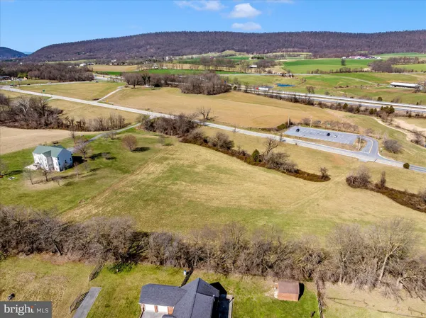 a view of an ocean and a mountain