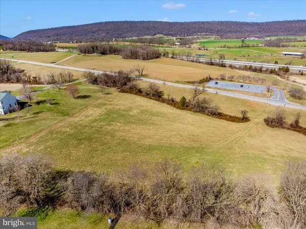 a view of an ocean and a mountain