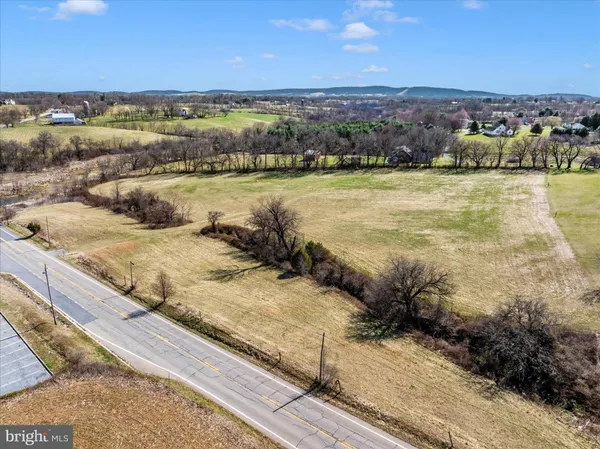 a view of an ocean and city
