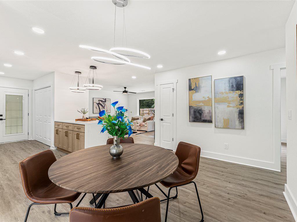 531 Carlton Road Palmetto, GA 30268 - Photo 17 of 38 a view of a dining room with furniture and wooden floor
