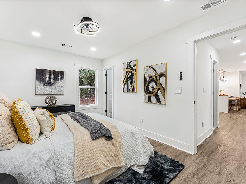 531 Carlton Road Palmetto, GA 30268 - Photo 24 of 38 a bedroom with a bed and a walk in closet