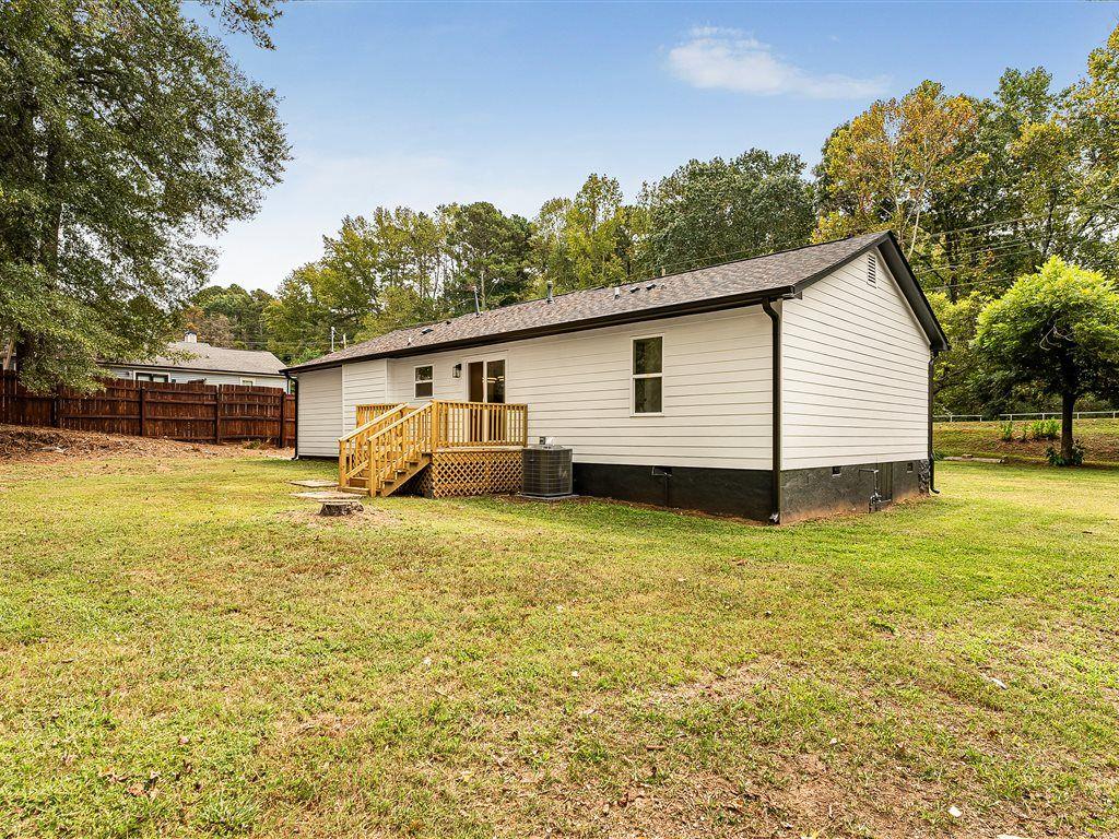 531 Carlton Road Palmetto, GA 30268 - Photo 31 of 38 a view of a house with a yard