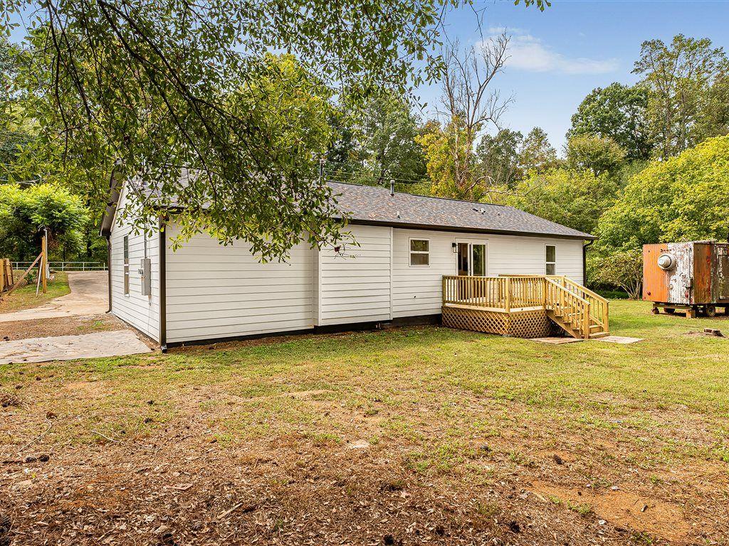 531 Carlton Road Palmetto, GA 30268 - Photo 33 of 38 a view of a house with a yard
