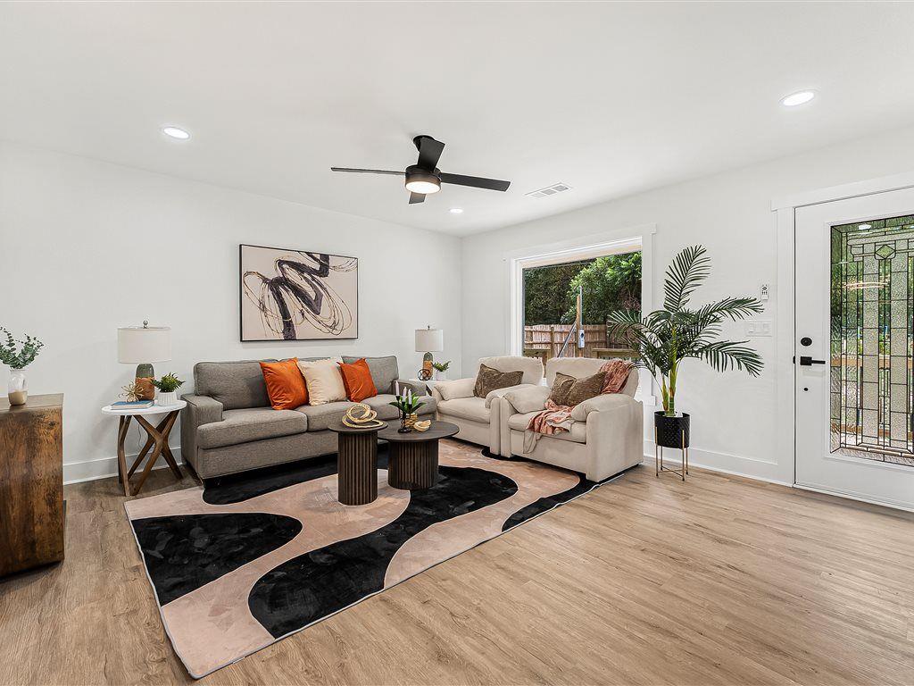 531 Carlton Road Palmetto, GA 30268 - Photo 5 of 38 a living room with furniture or couch and a wooden floor