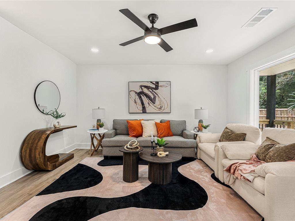 531 Carlton Road Palmetto, GA 30268 - Photo 6 of 38 a living room with furniture and a large window
