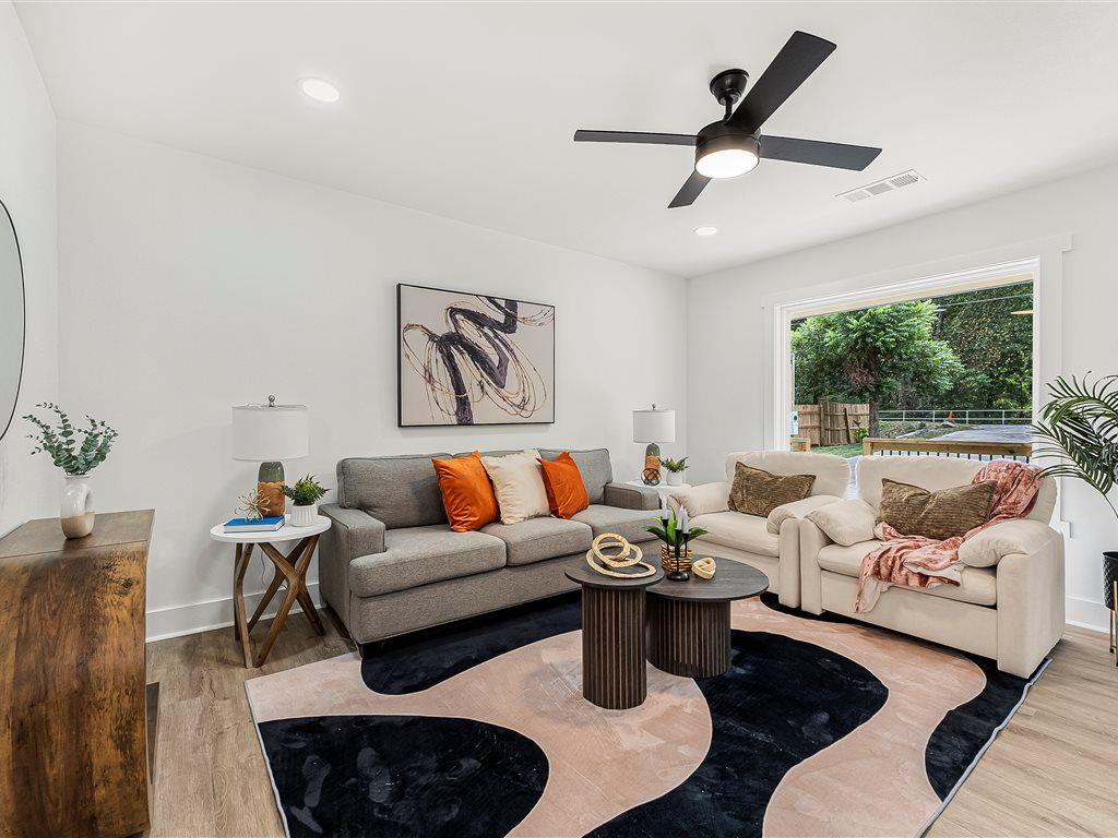 531 Carlton Road Palmetto, GA 30268 - Photo 7 of 38 a living room with furniture and a large window