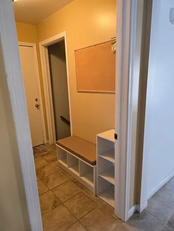 a bathroom with a sink a mirror and vanity