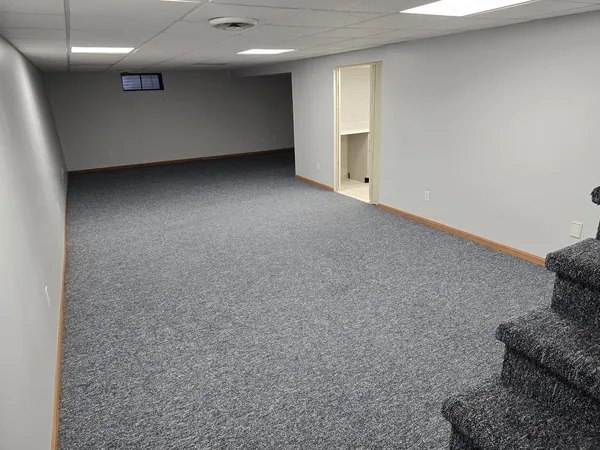 a view of a balcony with chairs