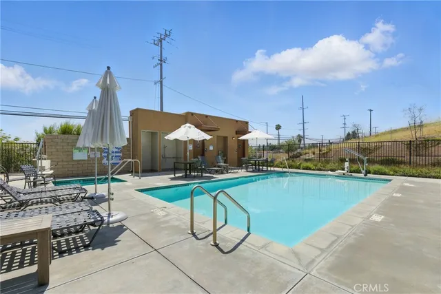 a view of a building with sitting area