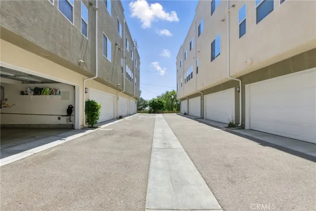 a view of backyard with sitting area