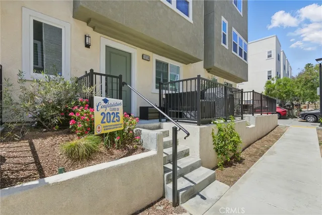 a view of a street with buildings
