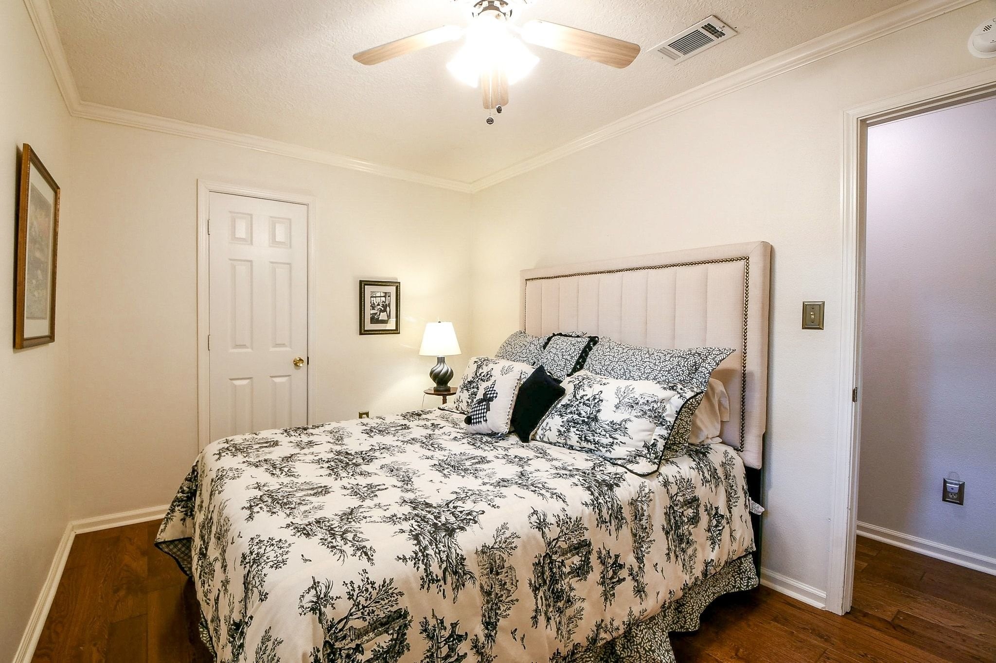 6607 Misty Springs Lane Spring, TX 77379 - Photo 20 of 31 Discover a charming bedroom featuring a cozy queen-size bed.