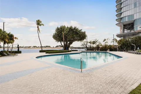 a view of a swimming pool with a lake