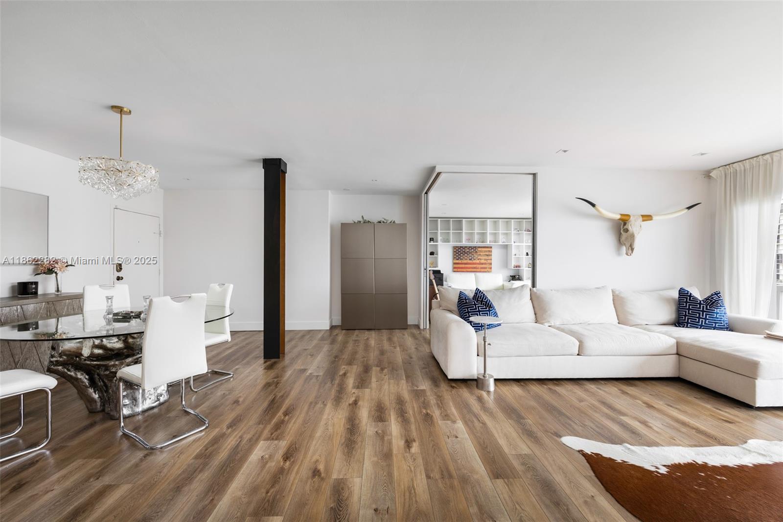 2451 Brickell Avenue, Unit 21D Miami, FL 33129 - Photo 7 of 21 a living room with furniture or couch and a wooden floor