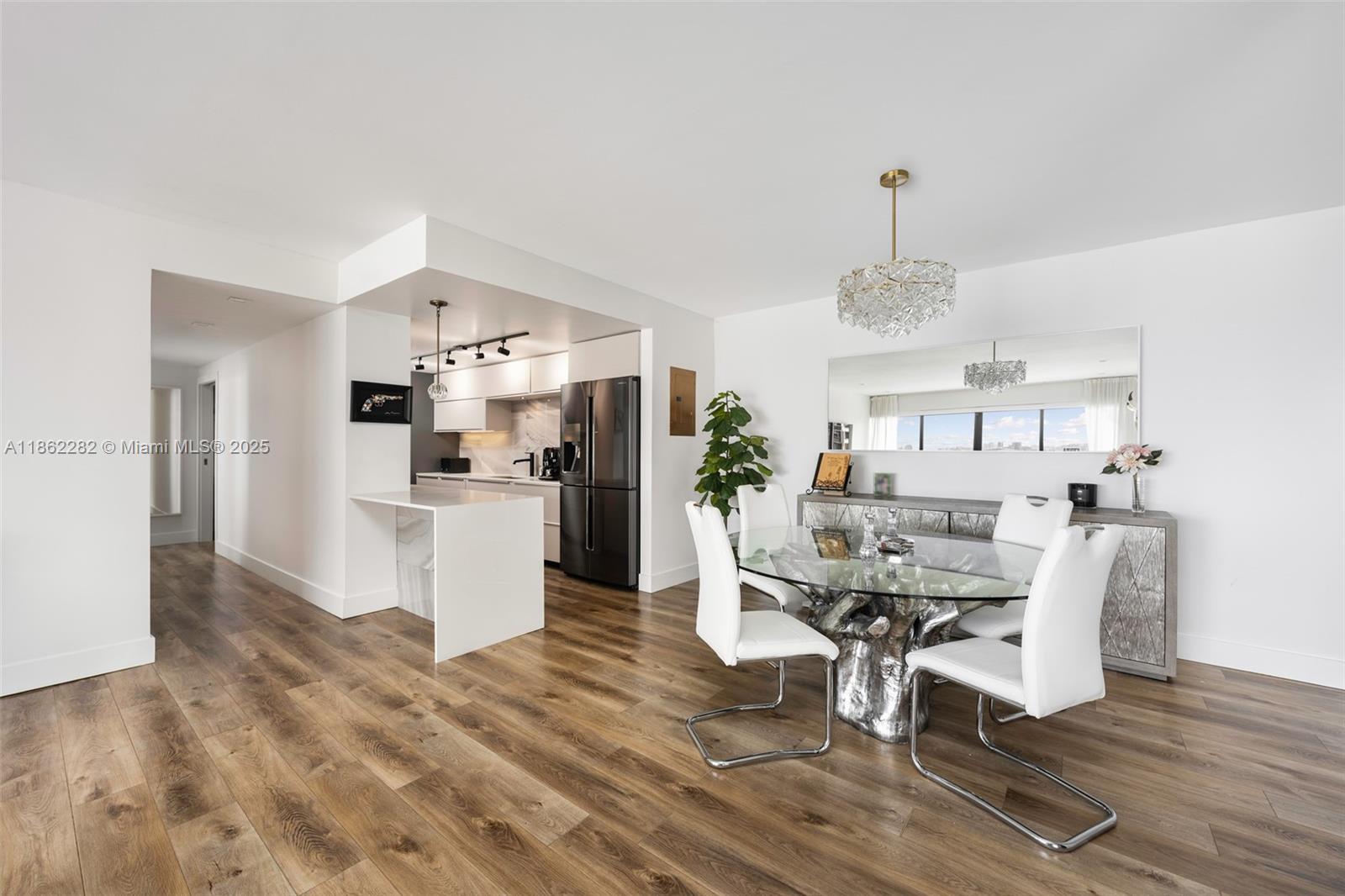2451 Brickell Avenue, Unit 21D Miami, FL 33129 - Photo 8 of 21 a view of a kitchen and dining room