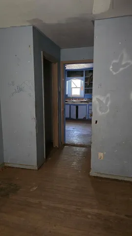 a view of an empty room with window