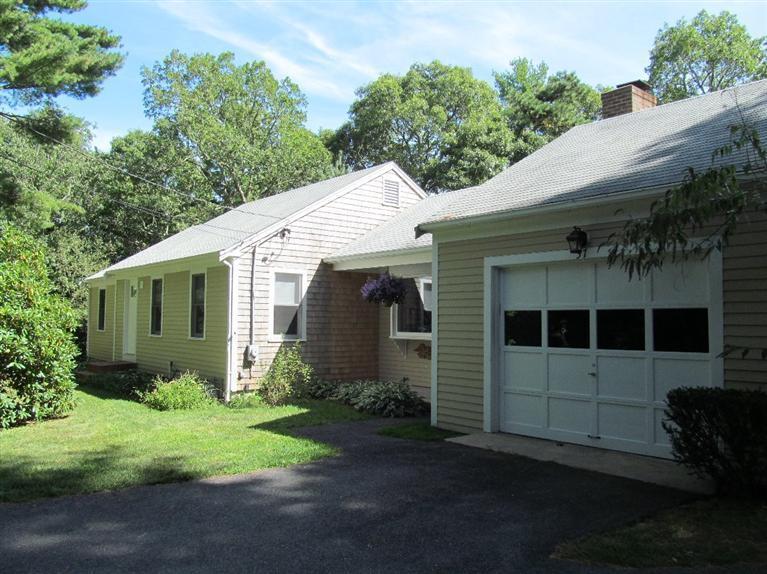 37 Valley Brook Road Centerville, MA 02632 - Photo 1 of 26 a view of a back yard of the house