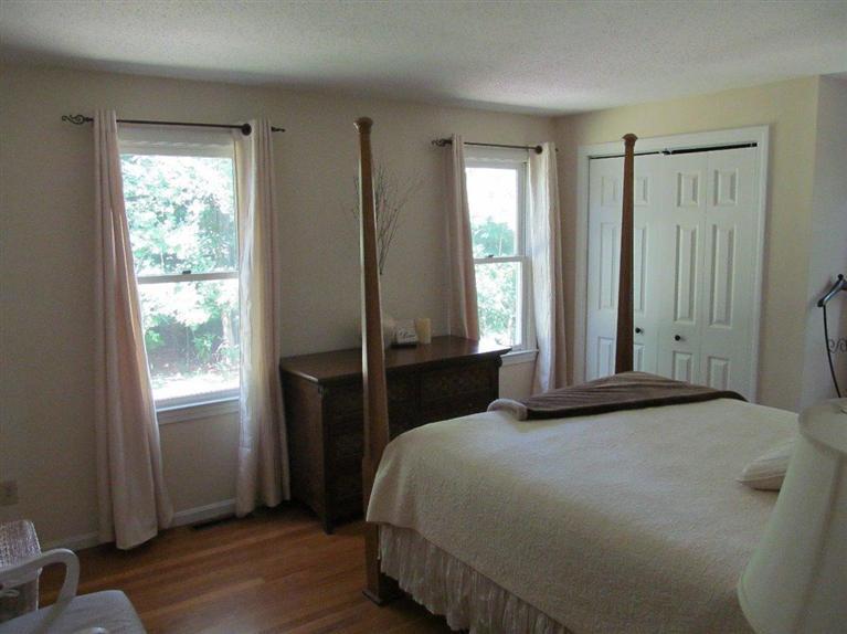37 Valley Brook Road Centerville, MA 02632 - Photo 11 of 26 a bedroom with a bed and a window