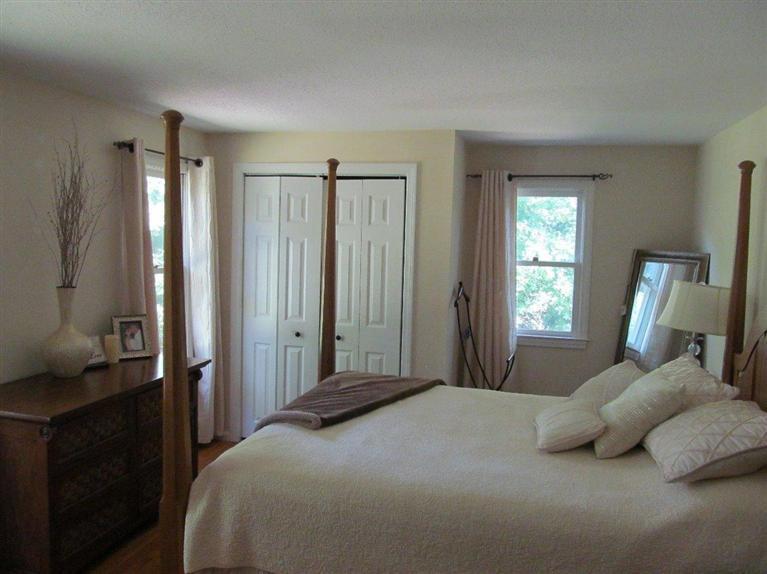 37 Valley Brook Road Centerville, MA 02632 - Photo 12 of 26 a bedroom with a bed and a window