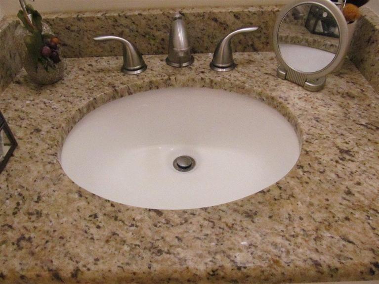 37 Valley Brook Road Centerville, MA 02632 - Photo 16 of 26 a bathroom with a granite countertop sink and mirror